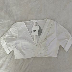 A fabulous white crop top - Can be paired with Jeans or skirt or shorts …